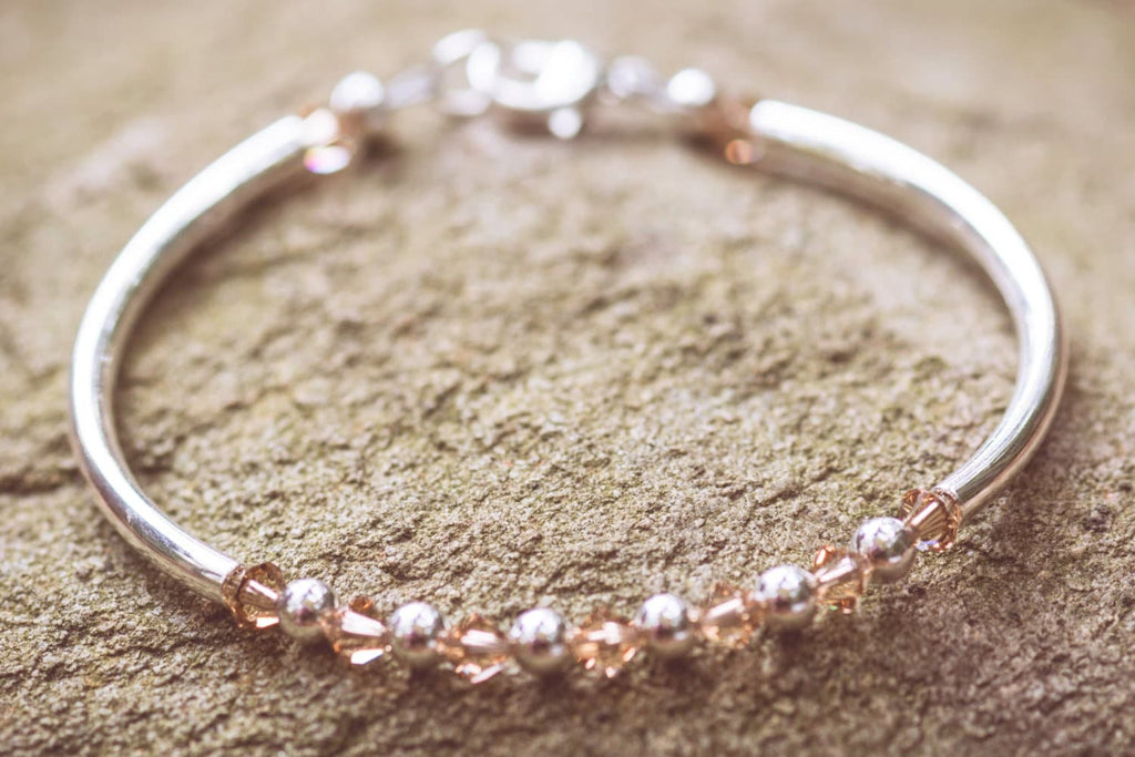 November Topaz Swarovski Crystal Birth Month Sterling Silver Plated Bracelet on stone