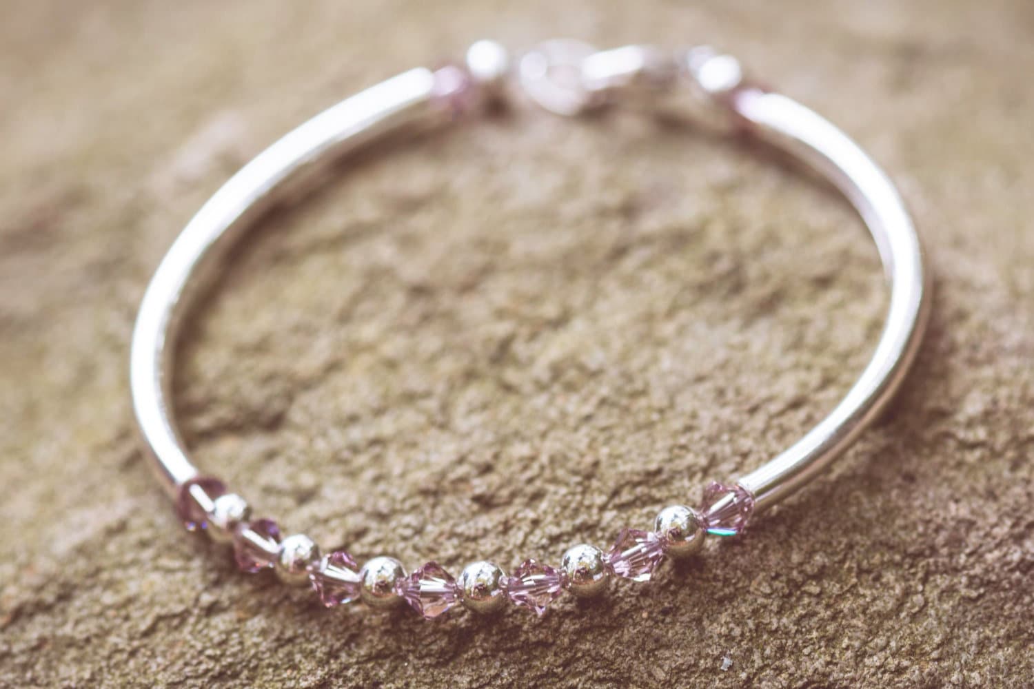 June Alexandrite Swarovski Crystal Birth Month Sterling Silver Plated Bracelet on stone