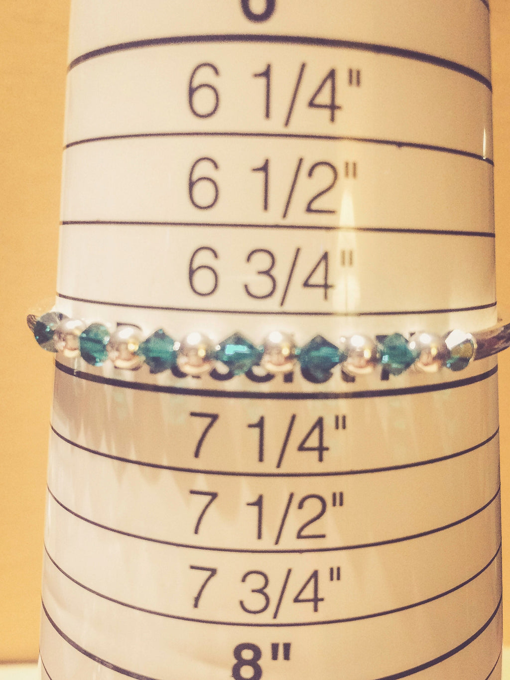 May Emerald Swarovski Crystal Birth Month Sterling Silver Plated Bracelet on bracelet measuring cone