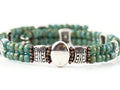 Button and Bows Desert Turquoise Cuff Memory Wire Bracelet on white background.