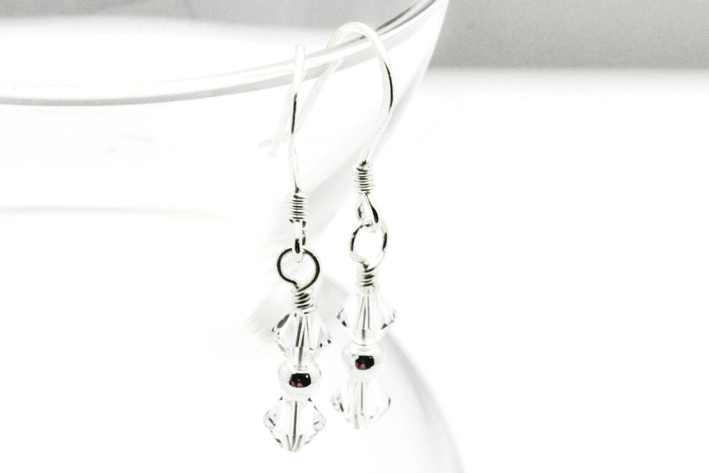 April Diamond Swarovski Crystal Birth Month Sterling Silver Drop Earrings hanging on vase