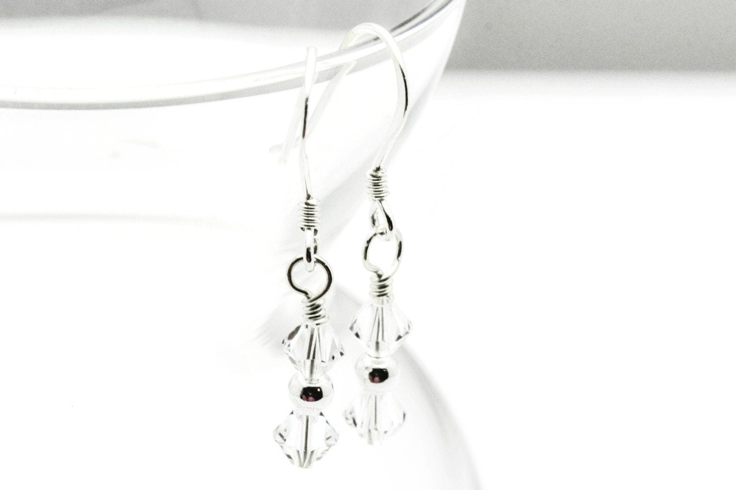 April Diamond Swarovski Crystal Birth Month Sterling Silver Drop Earrings hanging on vase