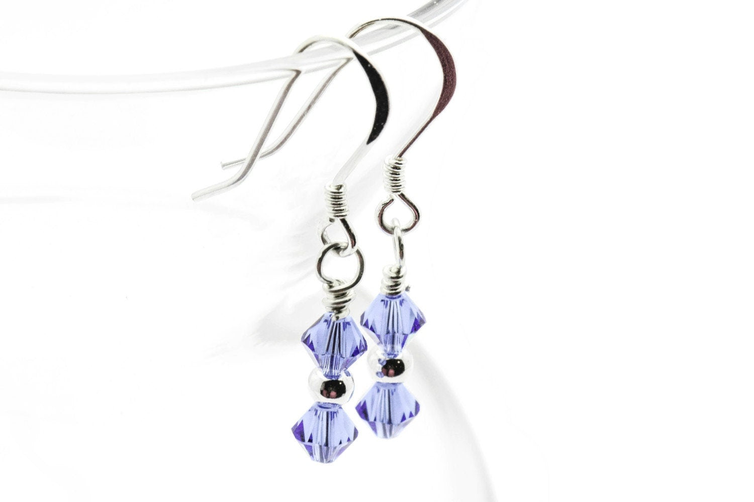 September Sapphire Swarovski Crystal Birth Month Sterling Silver Drop Earrings hanging on vase